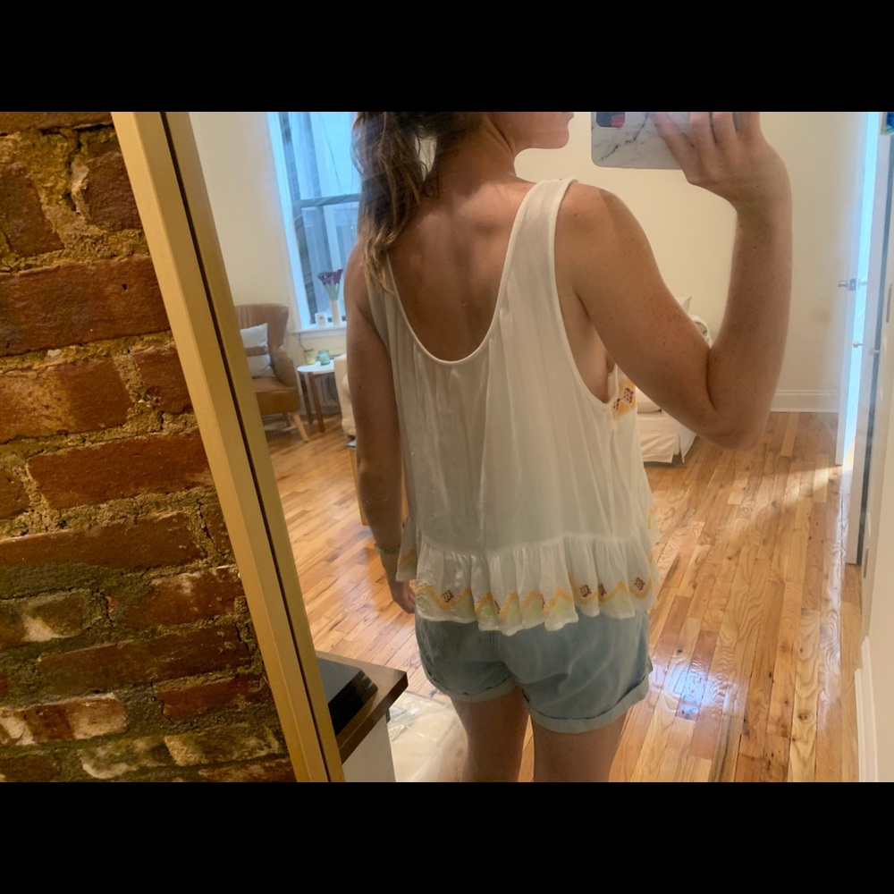Free people white flowy shirt. Size M
